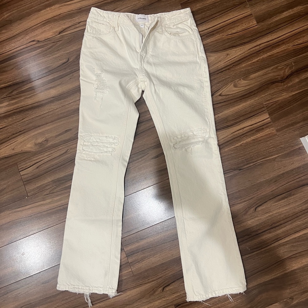 FRAME off white boot cut denim. NEW without tags. Perfect. Distressed